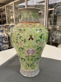 A Chinese famille rose lime-green-ground vase, Qianlong mark, 19/20th C.